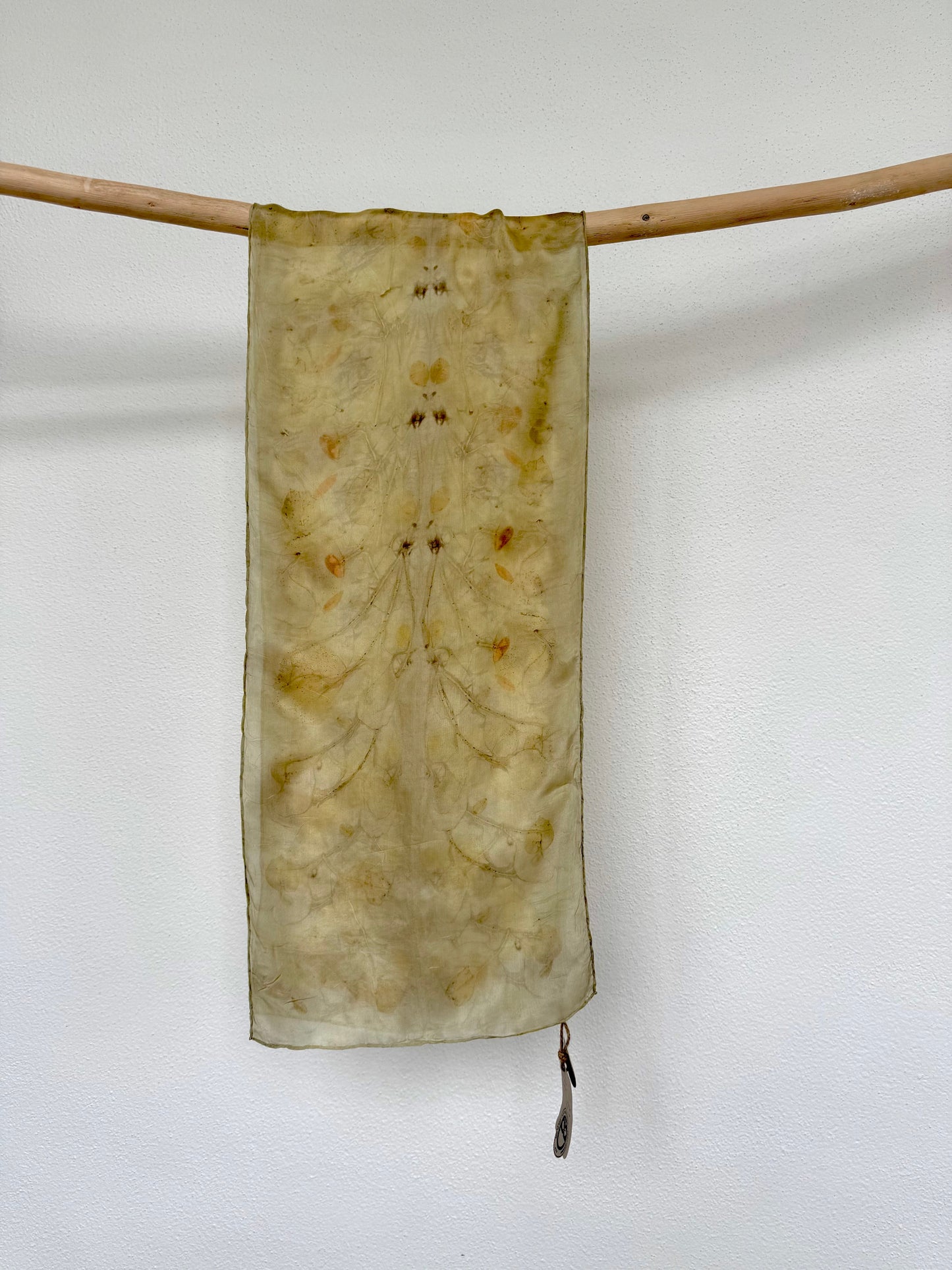 silk scarf naturally dyed with goldenrod flowers and eco-printed with eucalyptus leaves by DOT 'N' POT