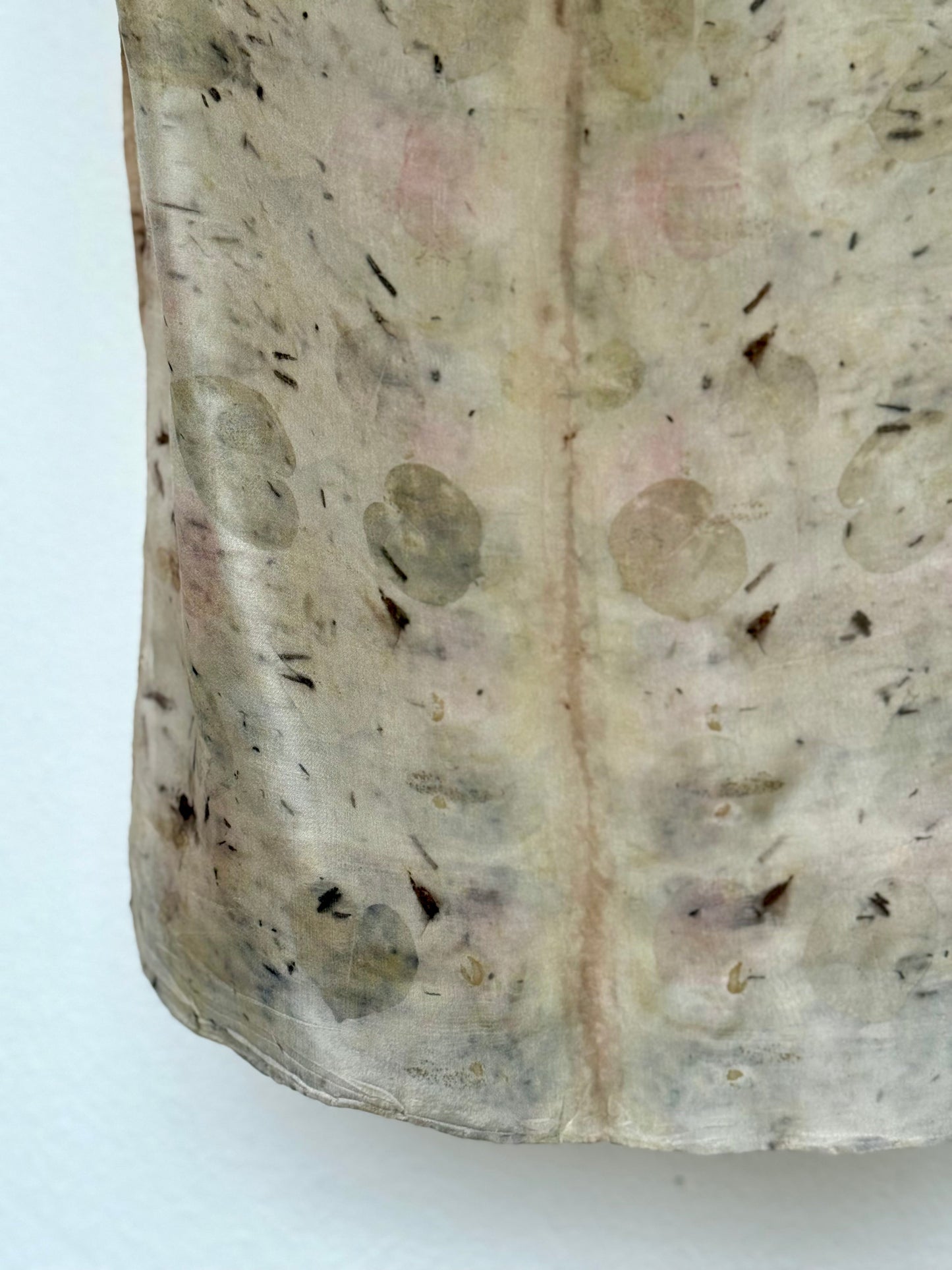 Close-up of a silk scarf naturally dyed and eco-printed with logwood and eucalyptus