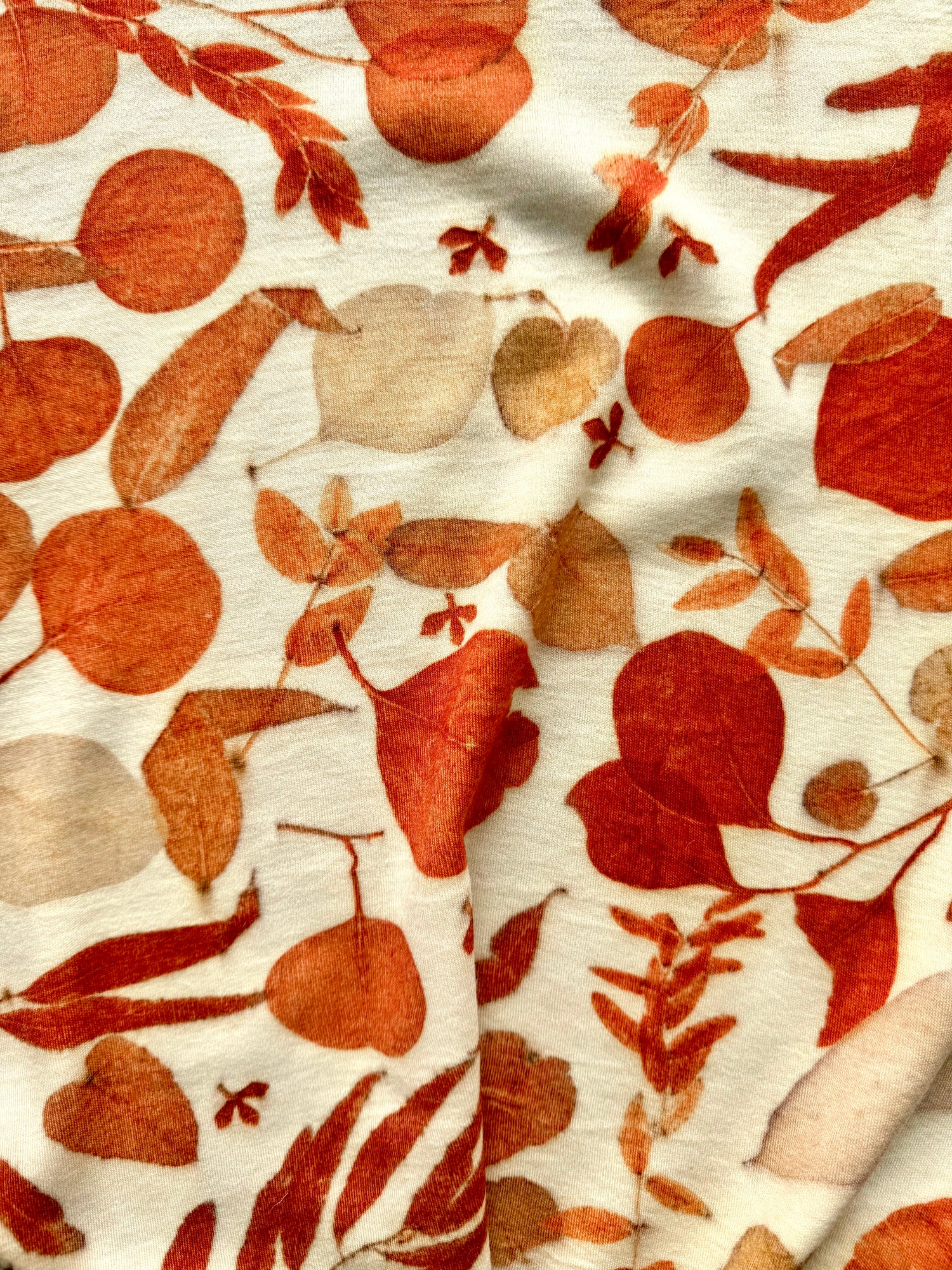 A merino wool jersey fabric eco-printed with eucalyptus leaves from the WORKSHOPS collection 