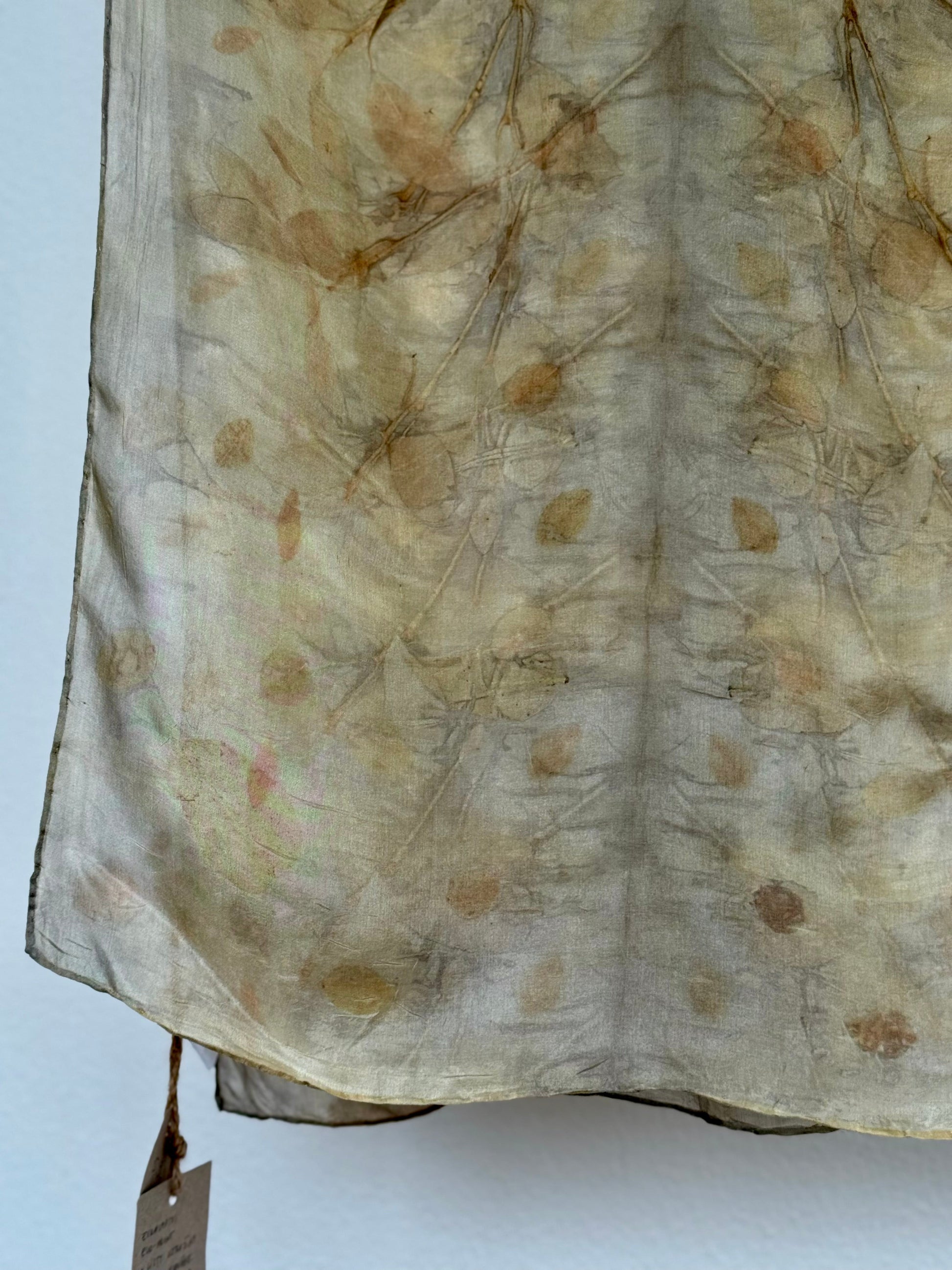 naturally dyed silk scarf with eucalyptus and blackberry leaves - close-up of the pattern