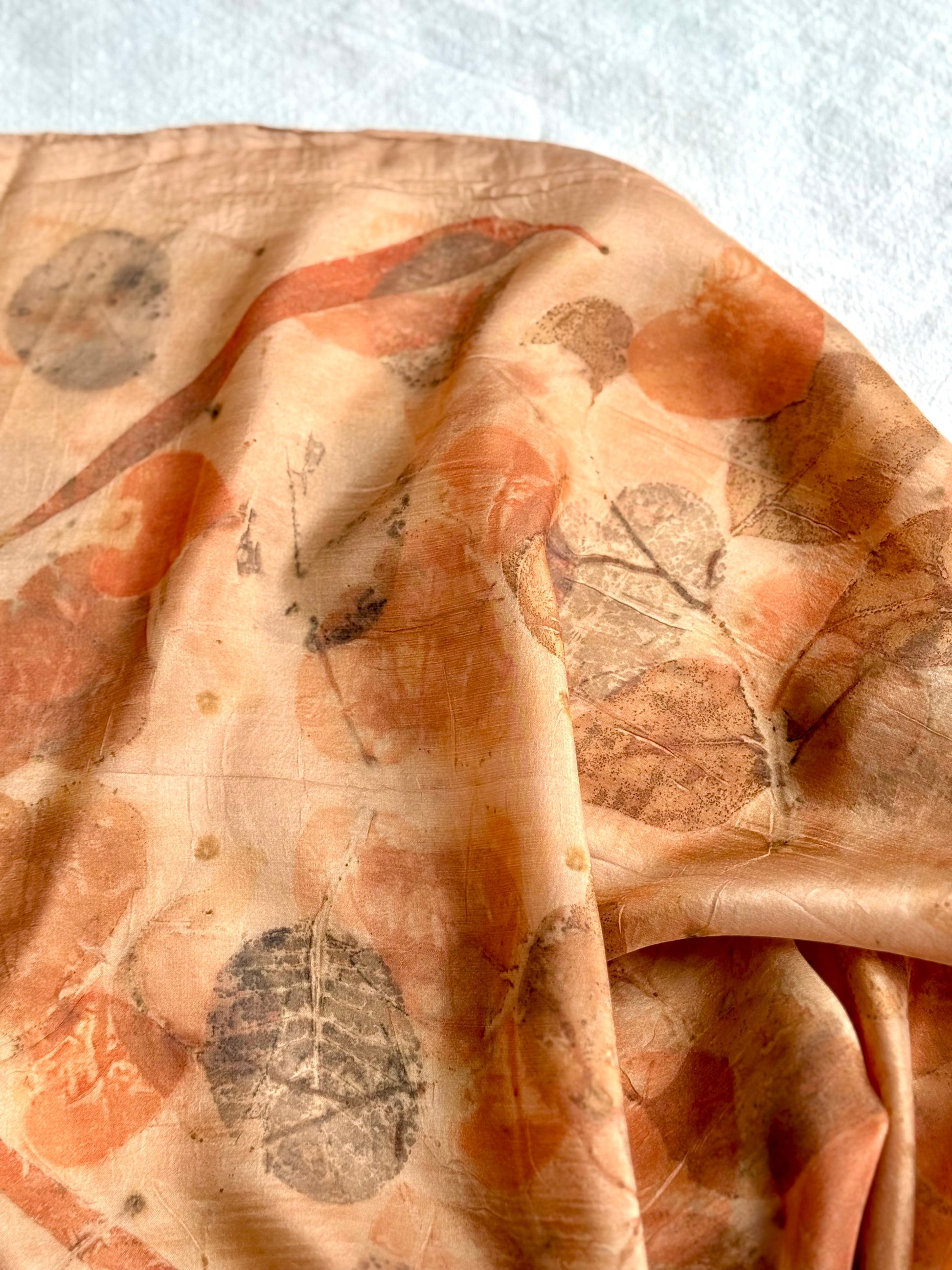 eco-printed orange silk scarf with eucalyptus leaves by DOT 'N' POT