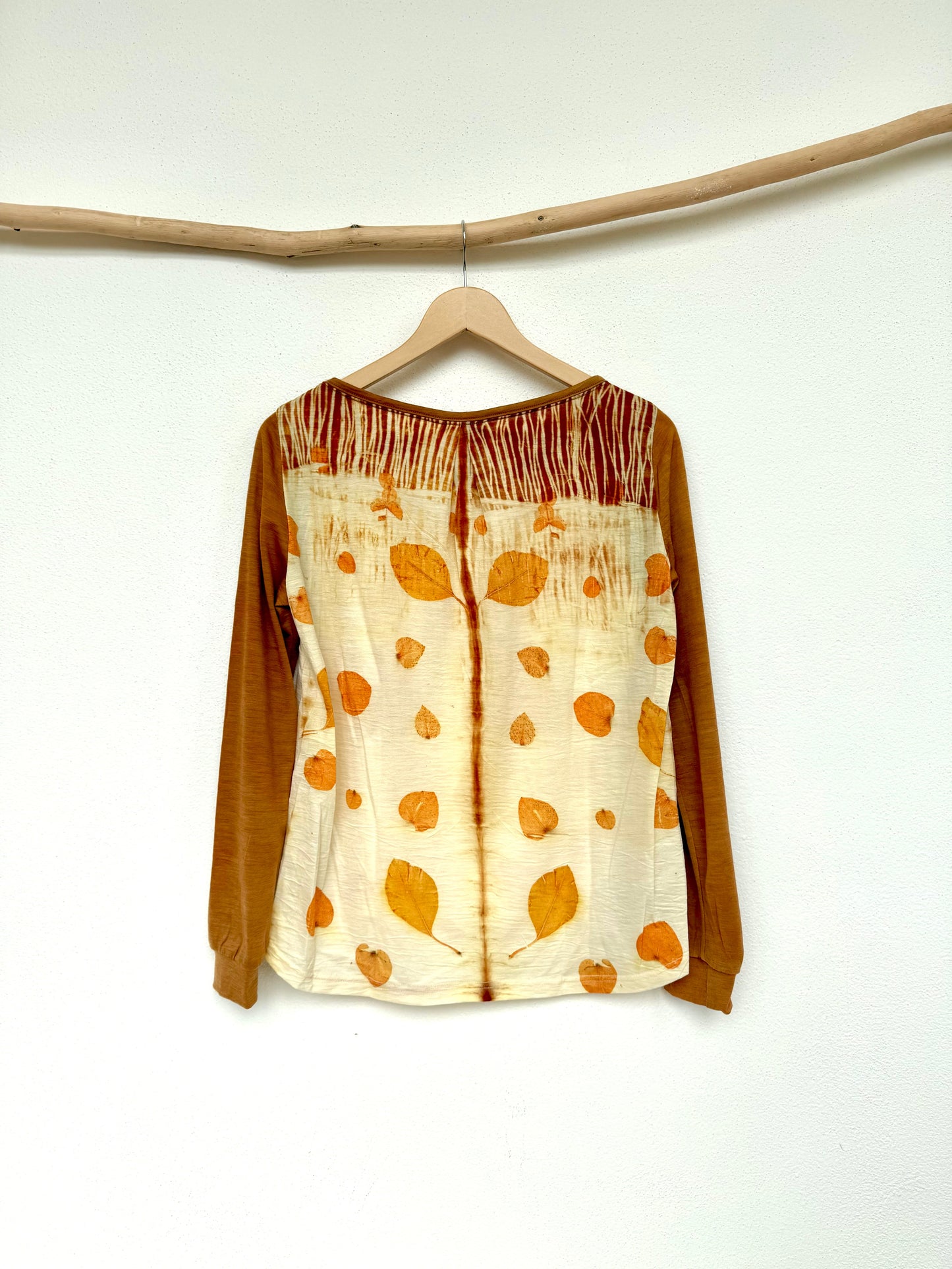 back of a naturally dyed merino top with eucalyptus tie-dye pattern