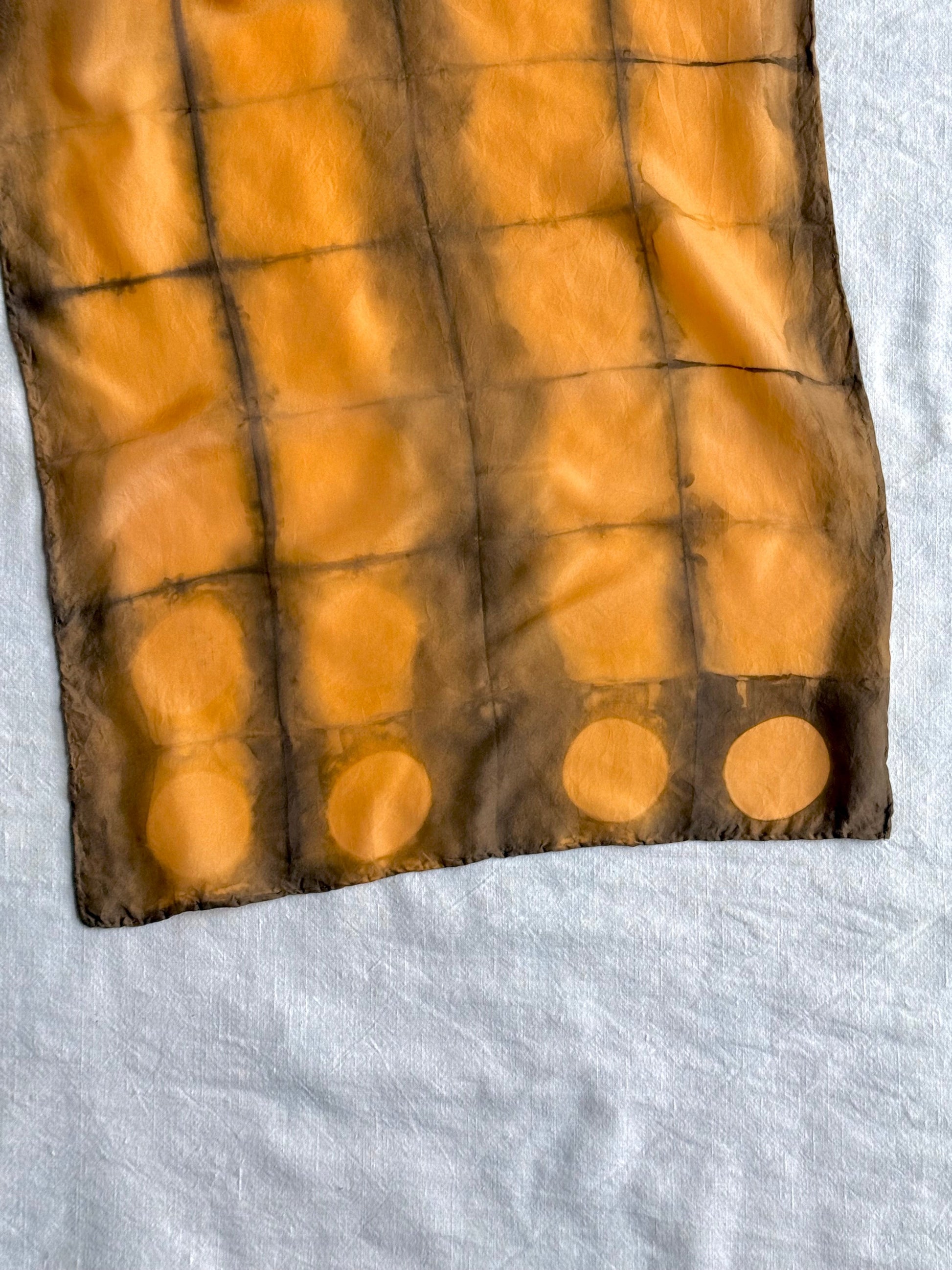Annatto dyed orange brodn shibori silk scarf  with square pattern 