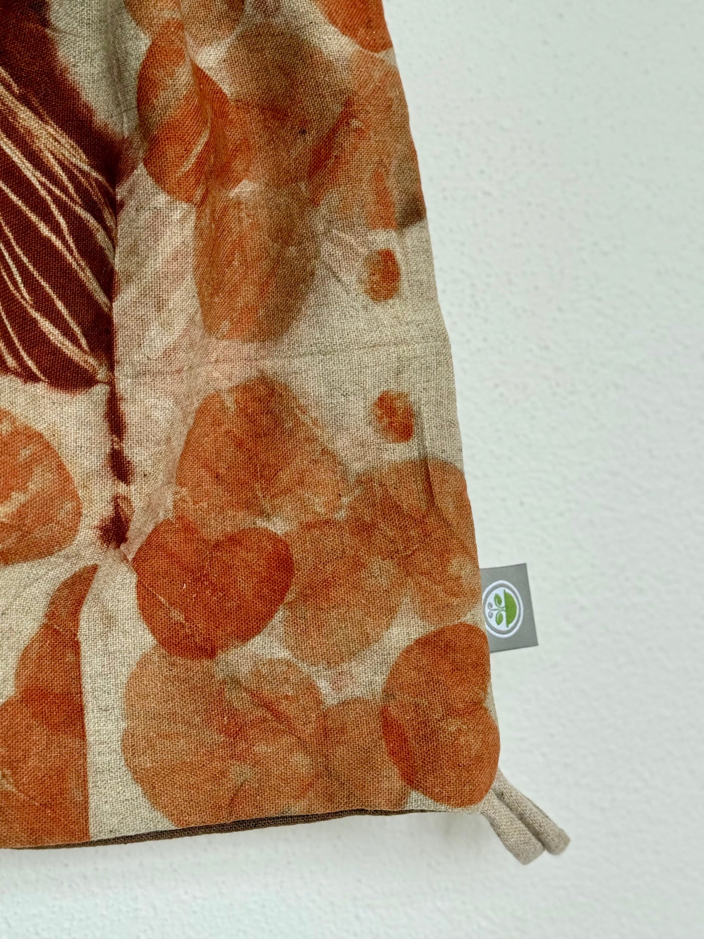 woolen bag with eco-print eucalyptus pattern and a DOT 'N' POT logo