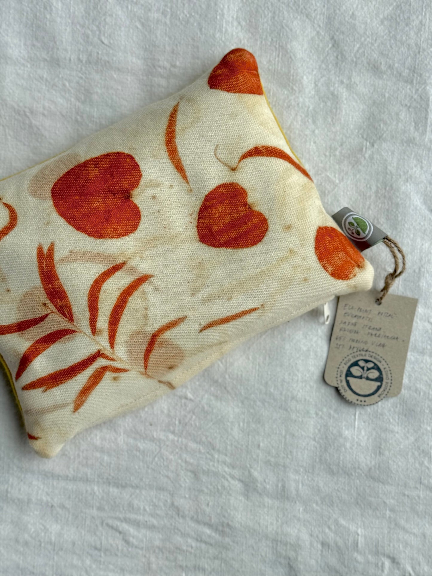 Fabric herbal dream pillow with eucalyptus pattern on a white background by DOT 'N' POT