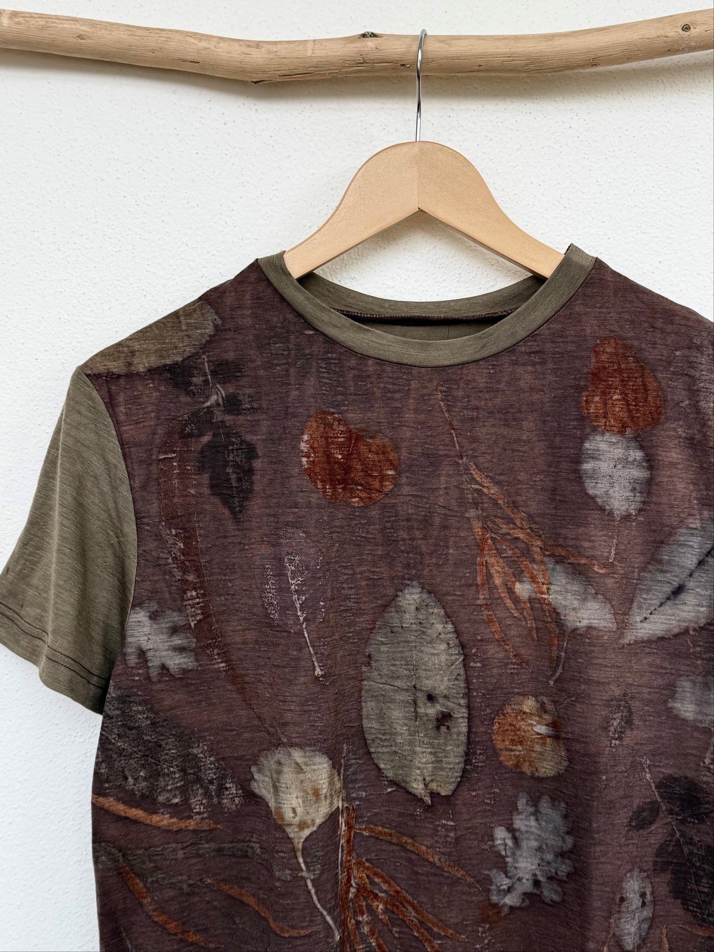 close-up of a sweet chestnut dyed and eco-printed merino t-shirt - front part