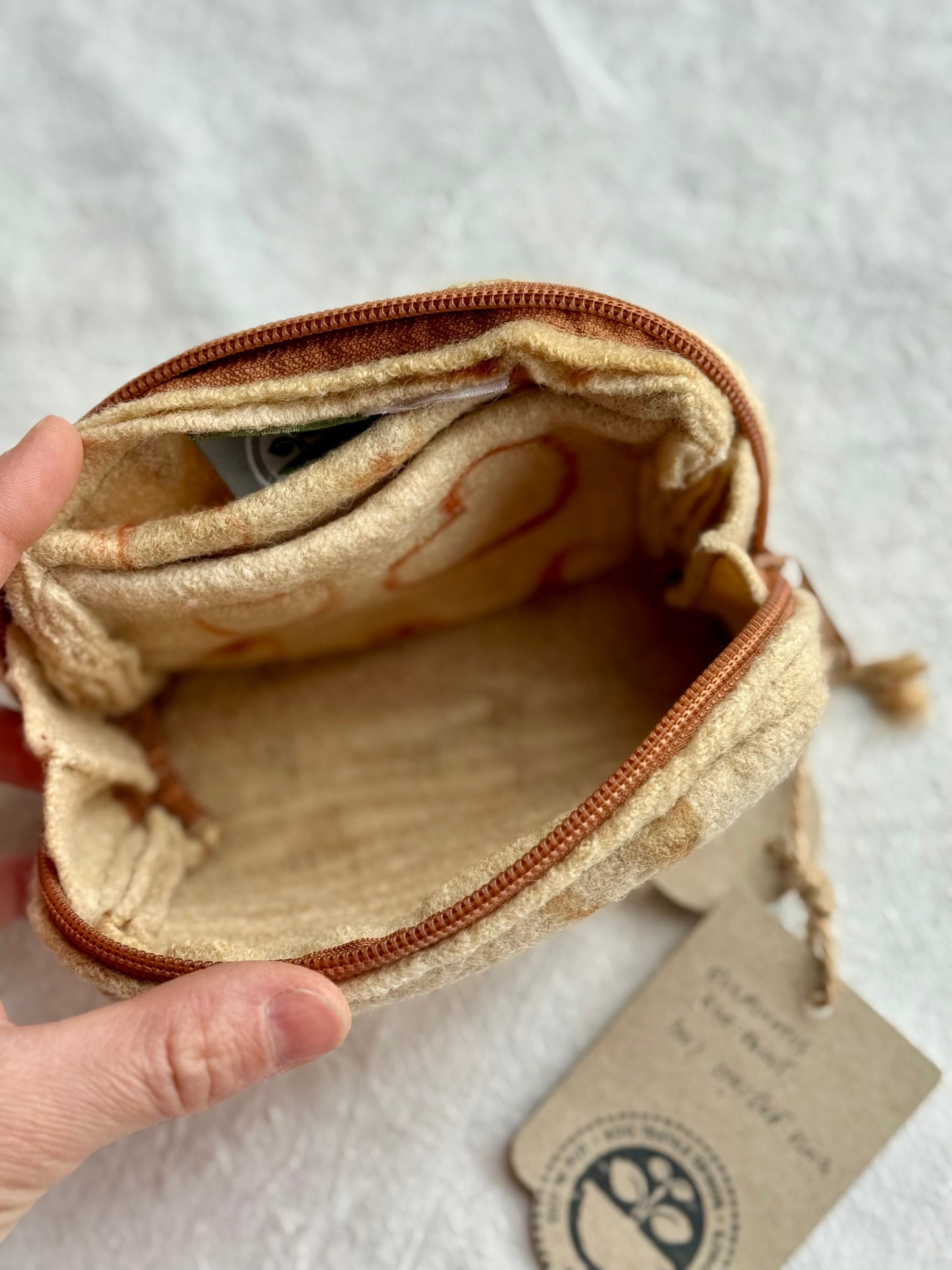 inside of a woolen purse with heart shaped pattern - detail with zipper