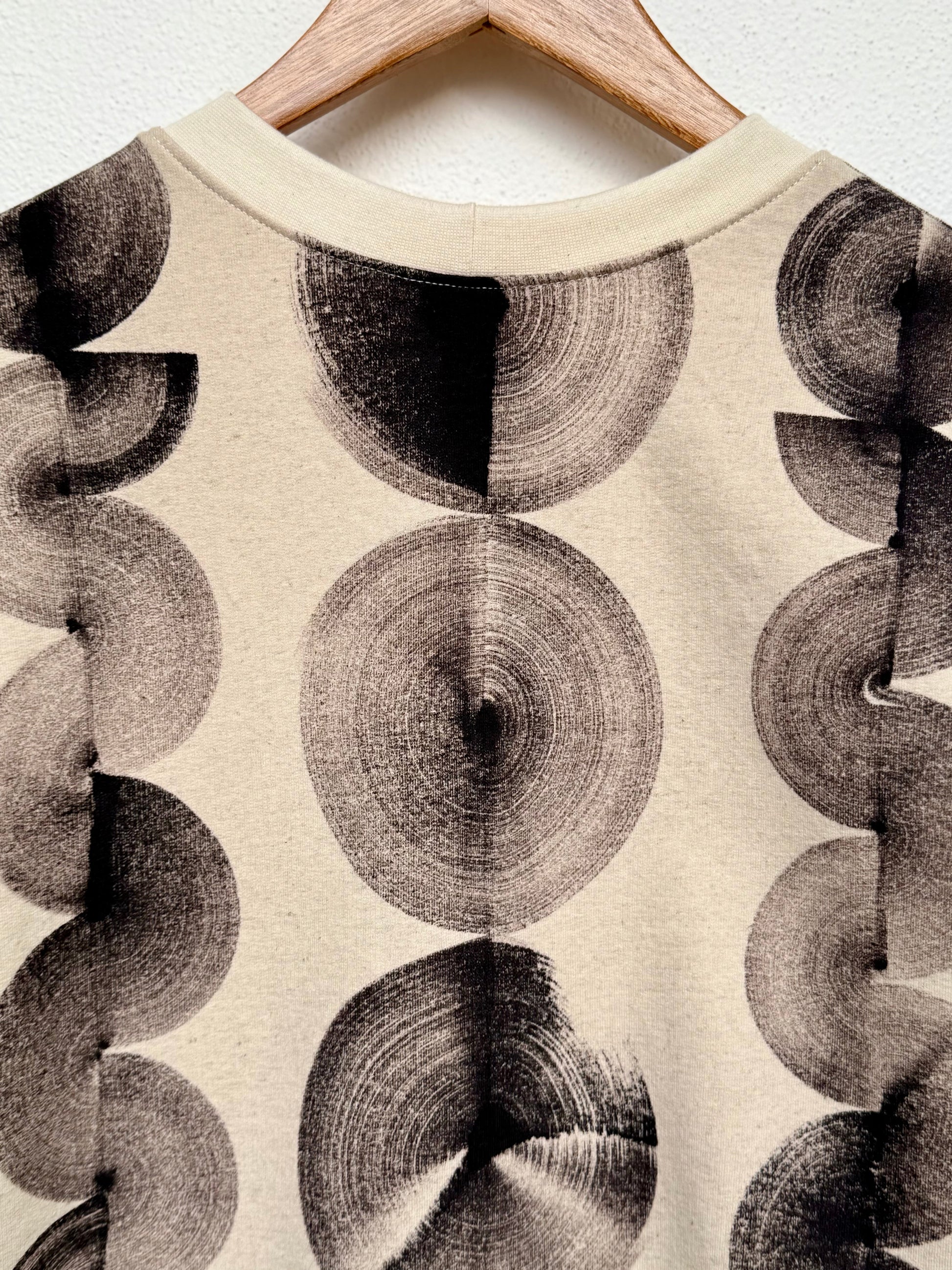 hand-painted black circular pattern close-up