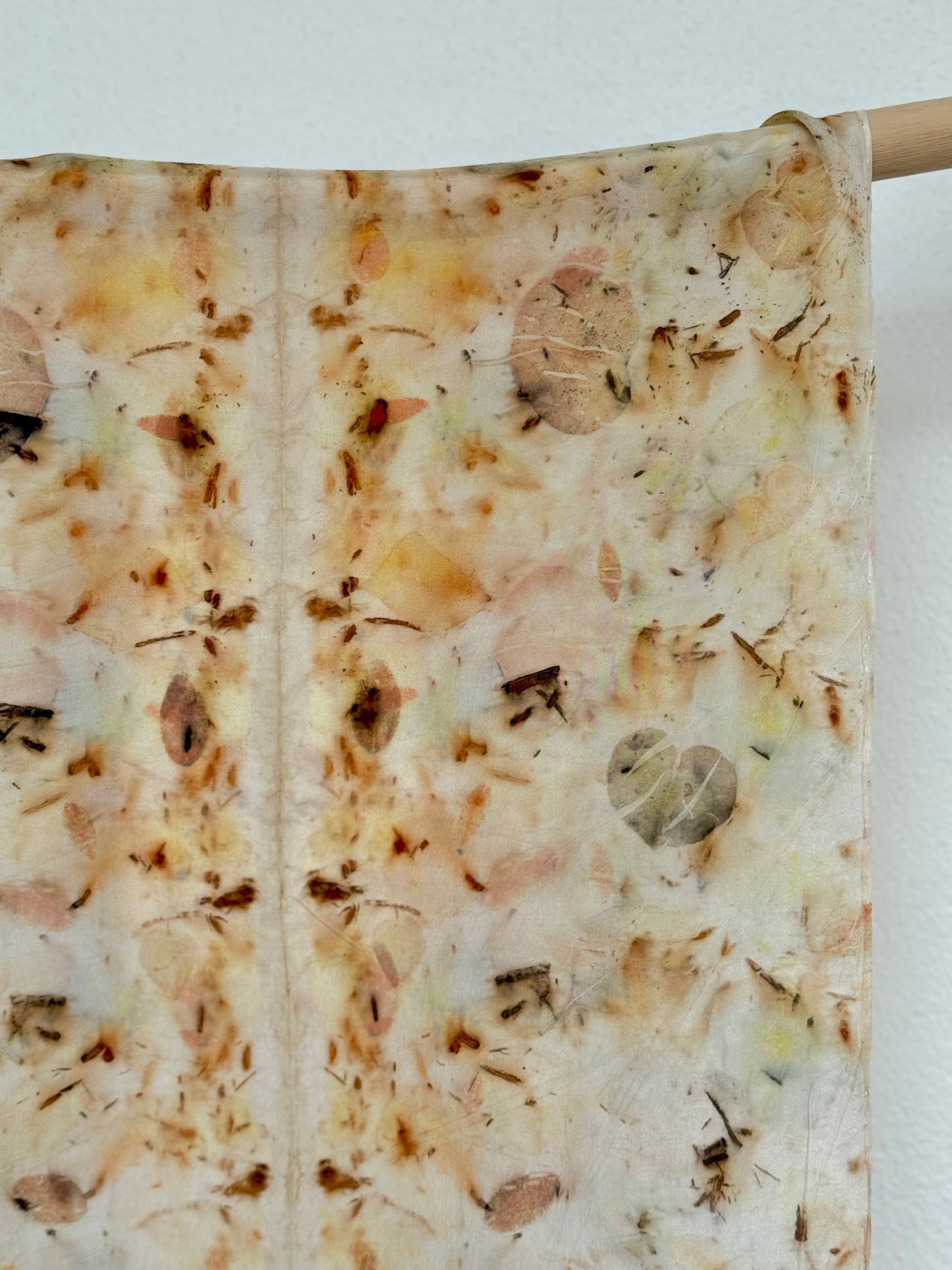 silk scarf with natural eco-print made with eucalyptus, logwood and safflover - close up of the pattern