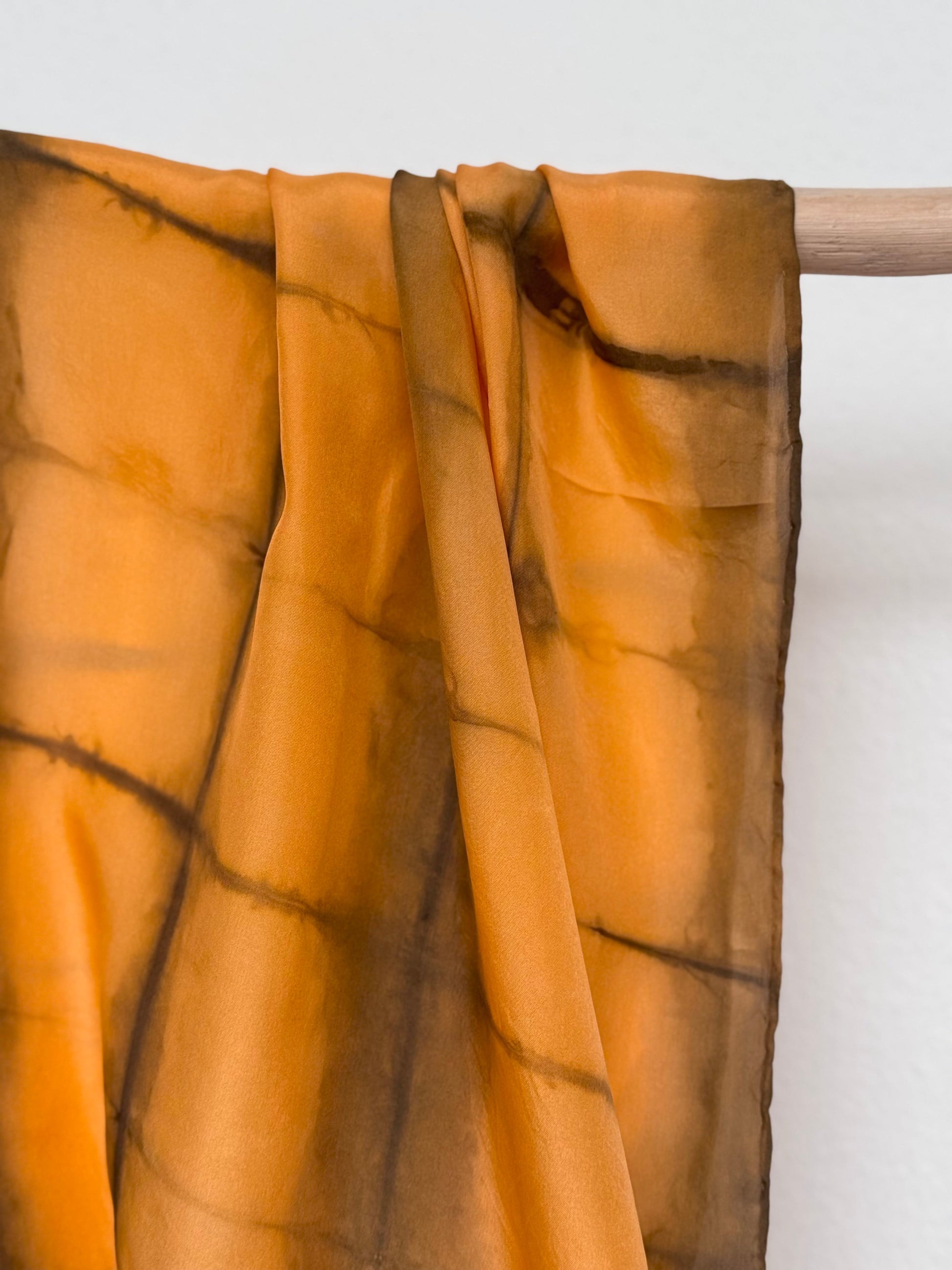 Annatto dyed shibori silk scarf by DOT 'N' POT