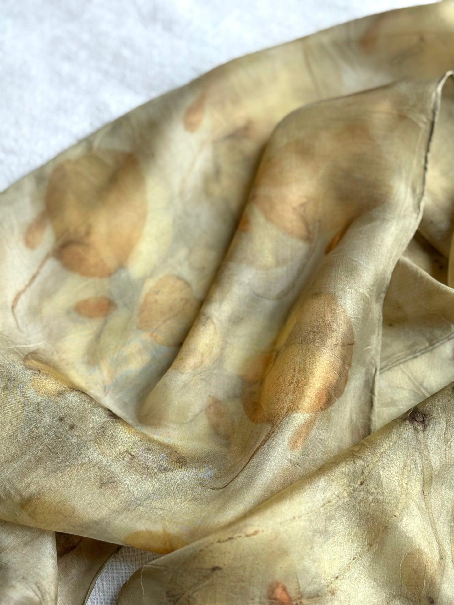 goldenrod dyed silk scarf with eucalyptus eco-print - detail of the pattern