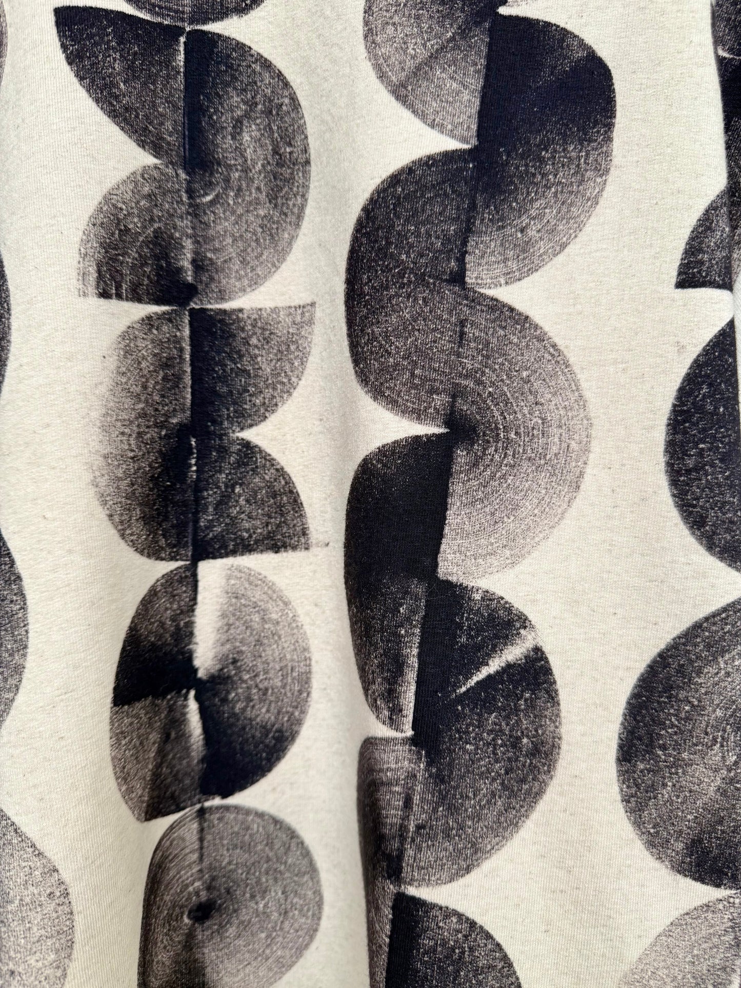 brush strokes made with iron paste on a boyfriend sweater