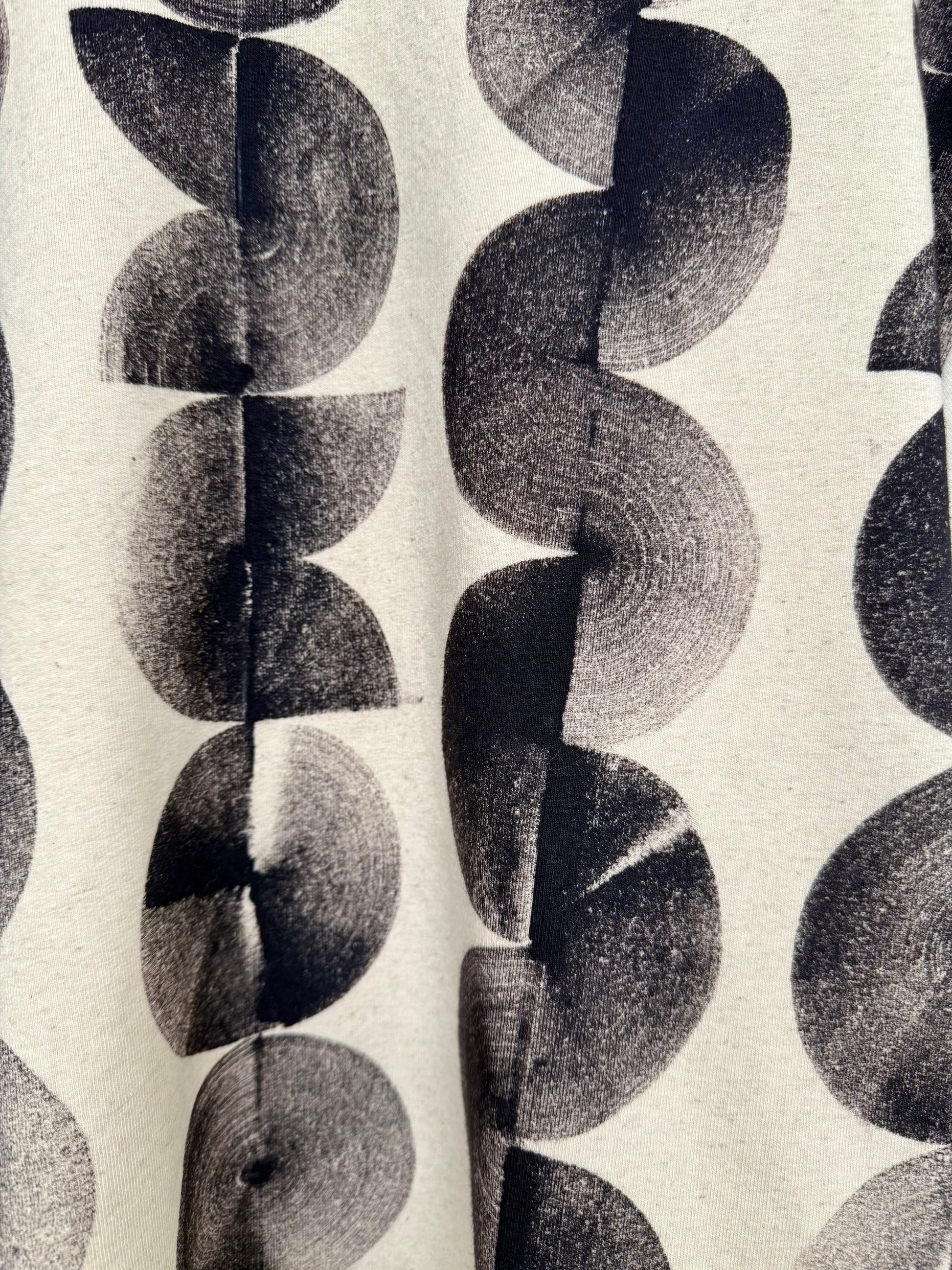 brush strokes made with iron paste on a boyfriend sweater