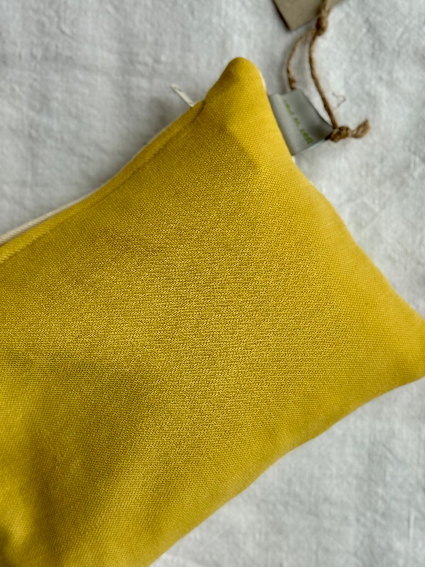 Close-up of a weld dyed natural herbal pillow