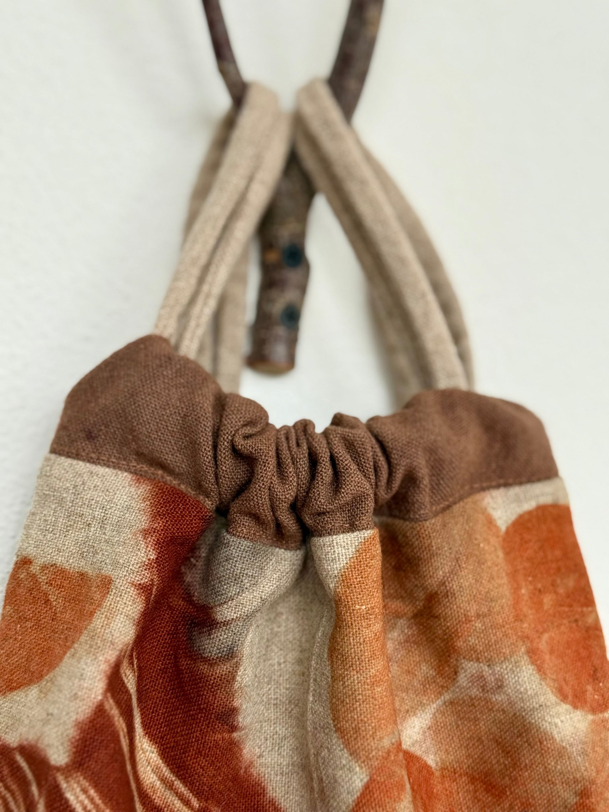 Close-up of a naturally dyed woolen drawstring bag