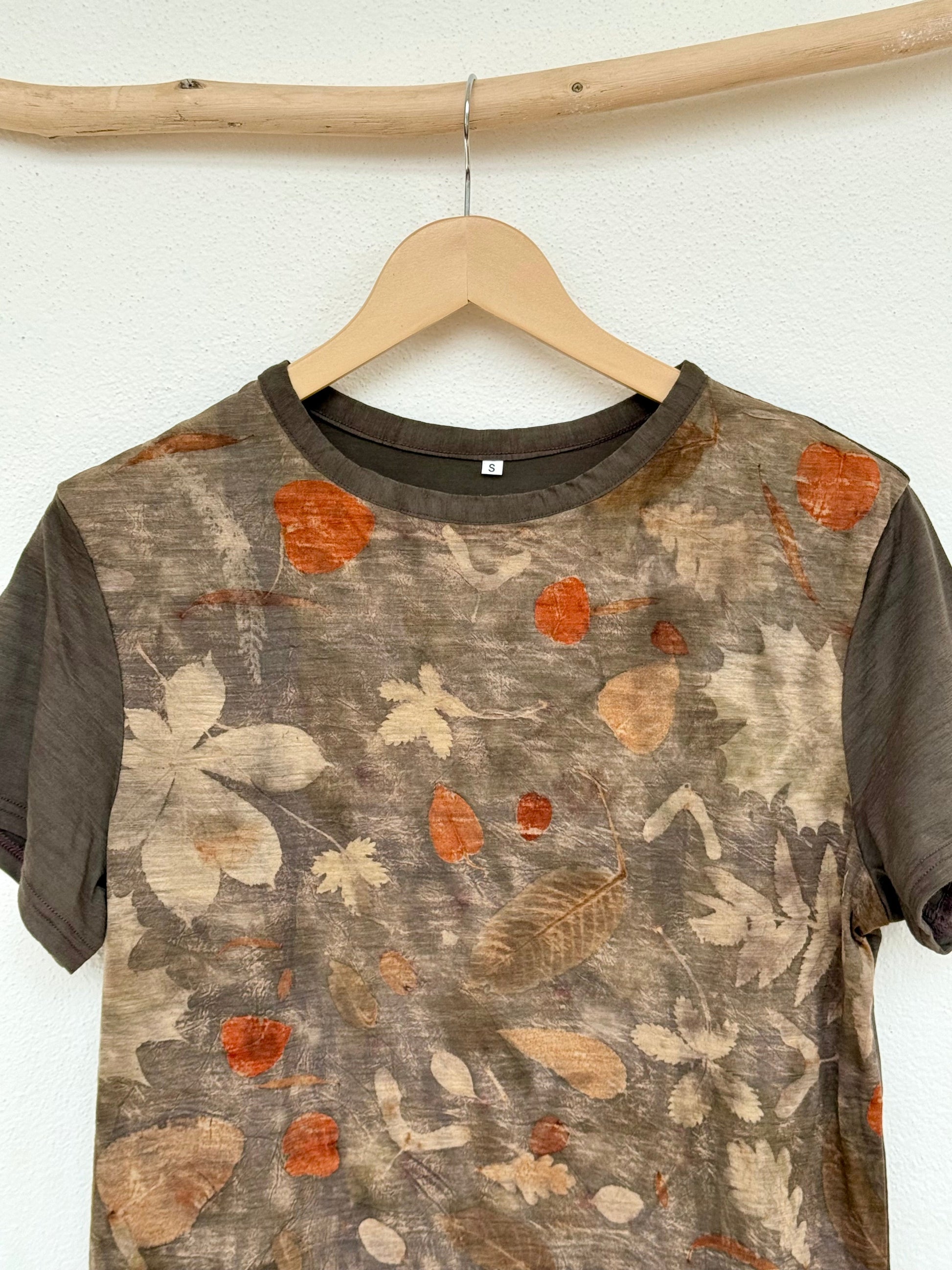 eco-printed merino t-shirt with leaves pattern - close up of the front part