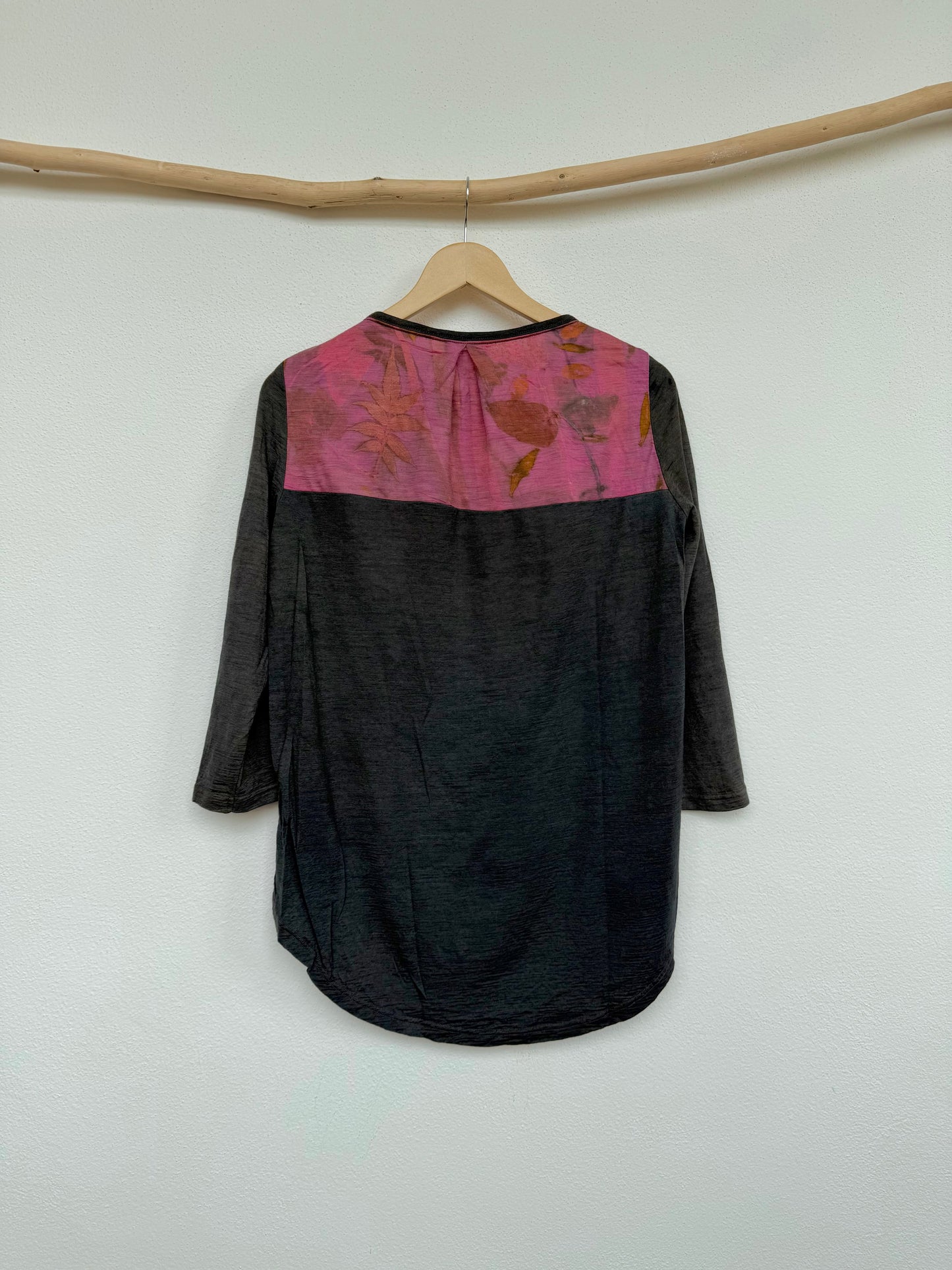 Back of a naturally gray dyed merino wool women's top with pink detail by DOT 'N' POT