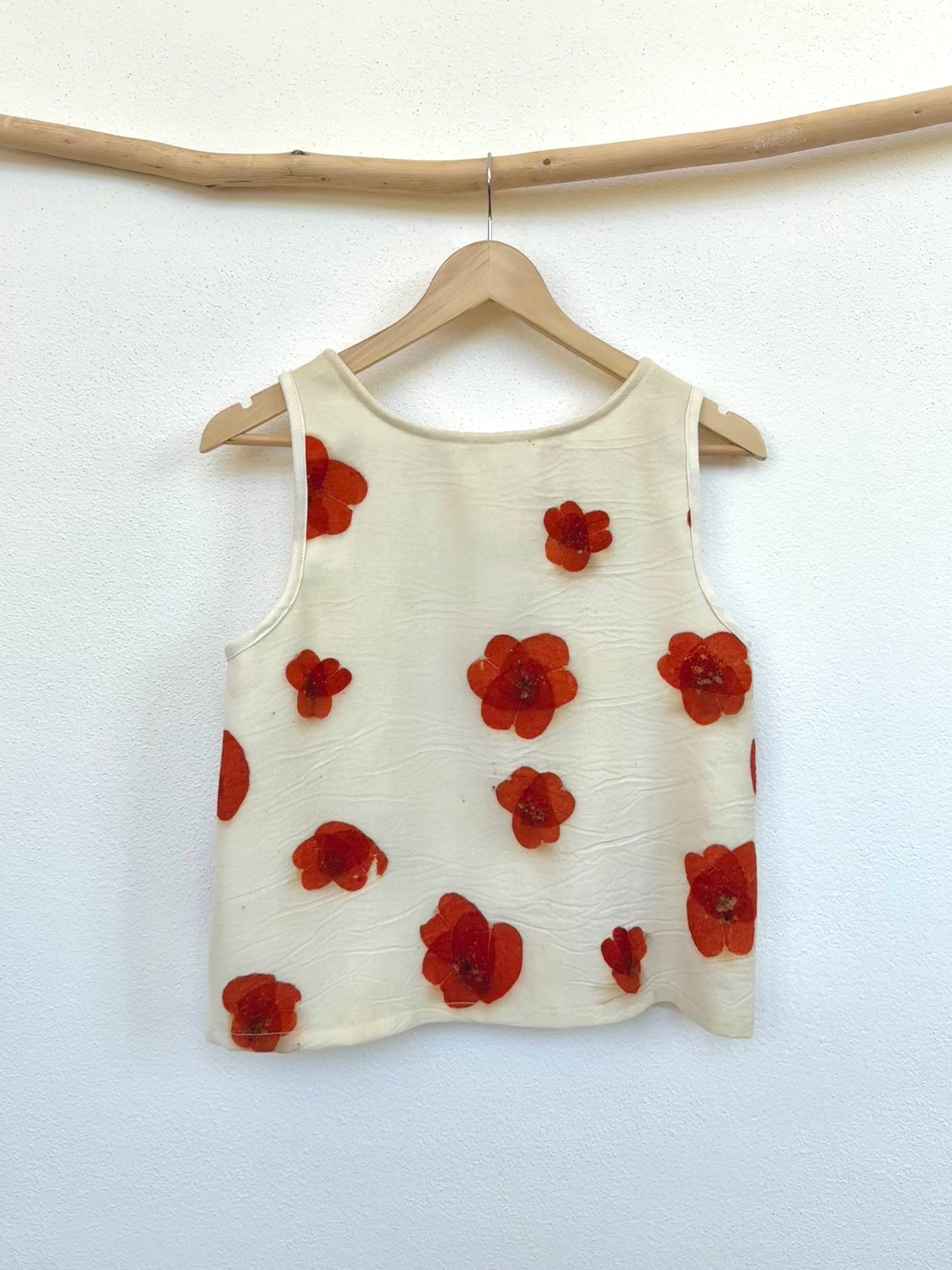 Beige merino wool tank top with red floral, eco-printed poppy pattern made with eucalyptus leaves by DOT 'N' POT - back view