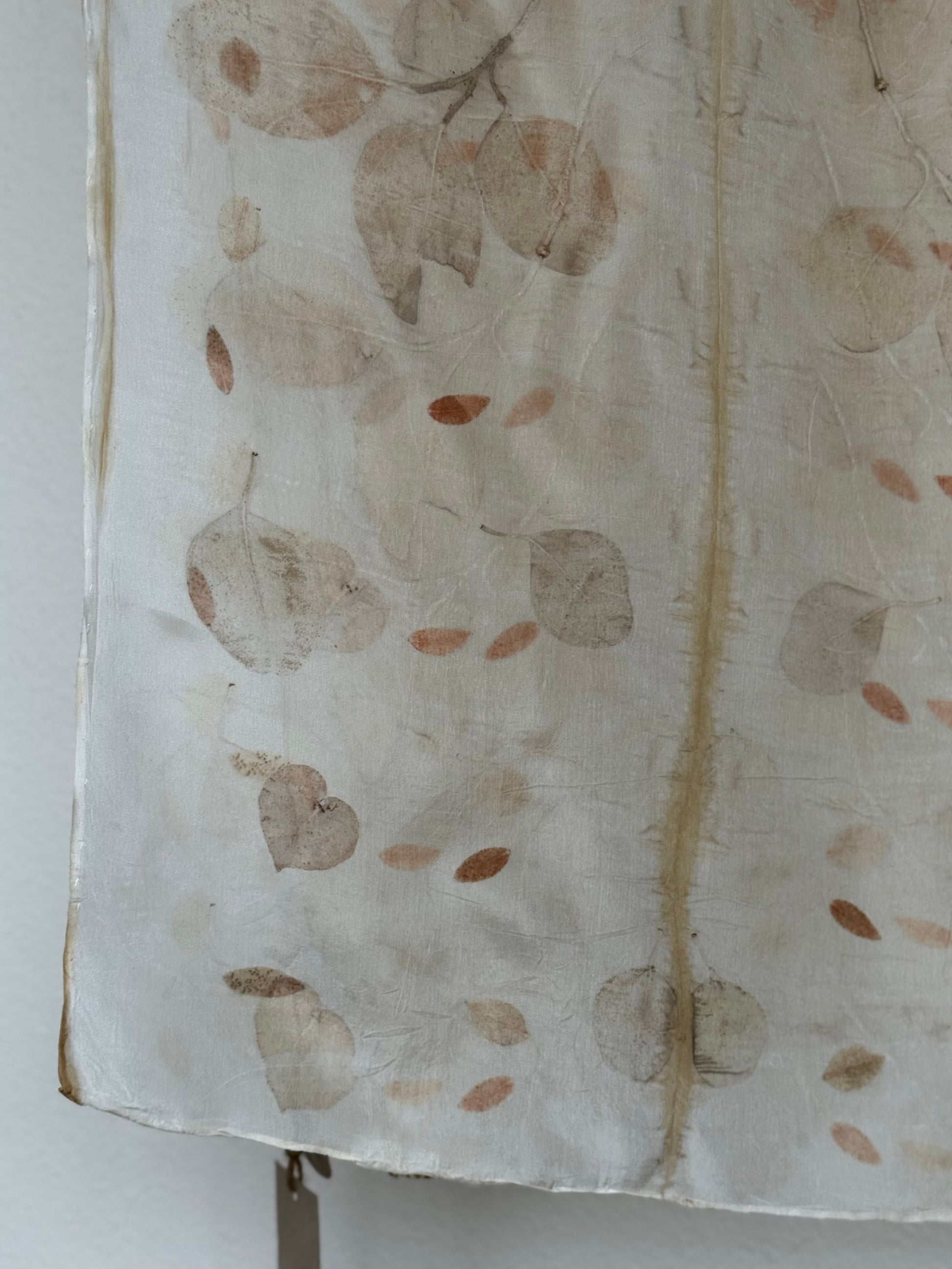 silk scarf with natural eco-print made with eucalyptus leaves - a detail of the eucalyptus leaves print