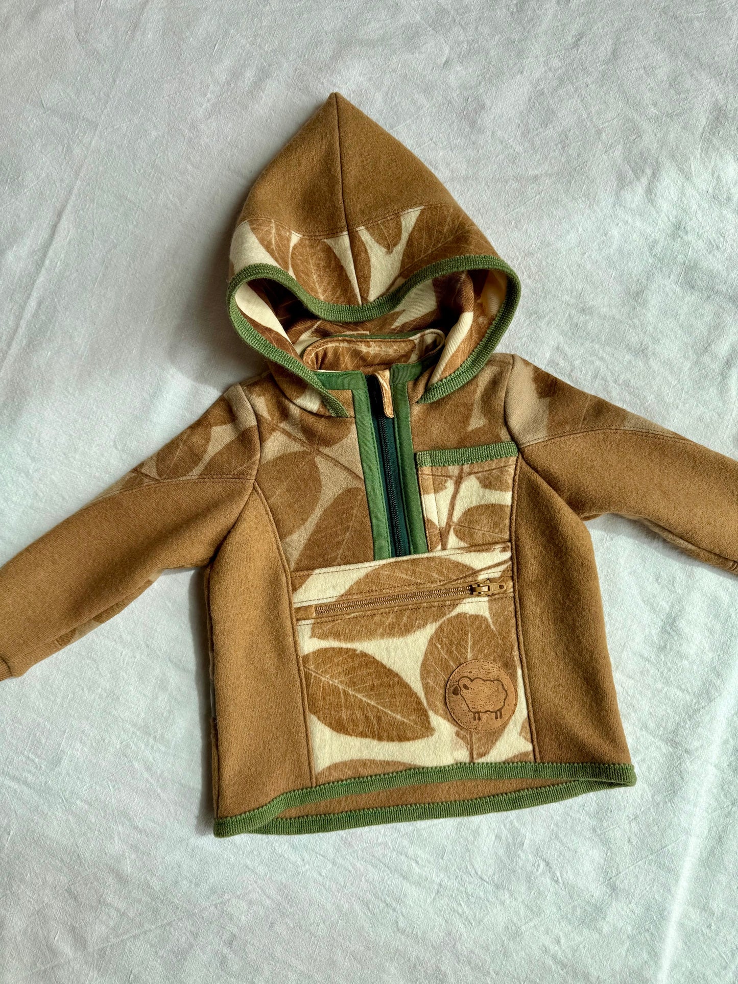 hooded sweater naturally dyed with walnut husks for kids, featuring walnut leaves pattern