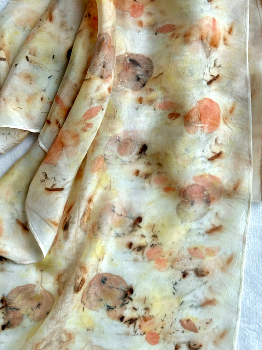 naturally dyed and eco-printed silk scarf with logwood and eucalyptus detail dyed with safflover