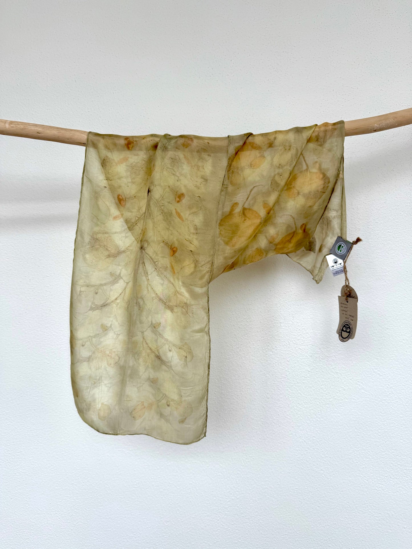 naturally dyed silk scarf with green goldenrod colour and gray-orange eucalyptus eco-print by DOT 'N' POT