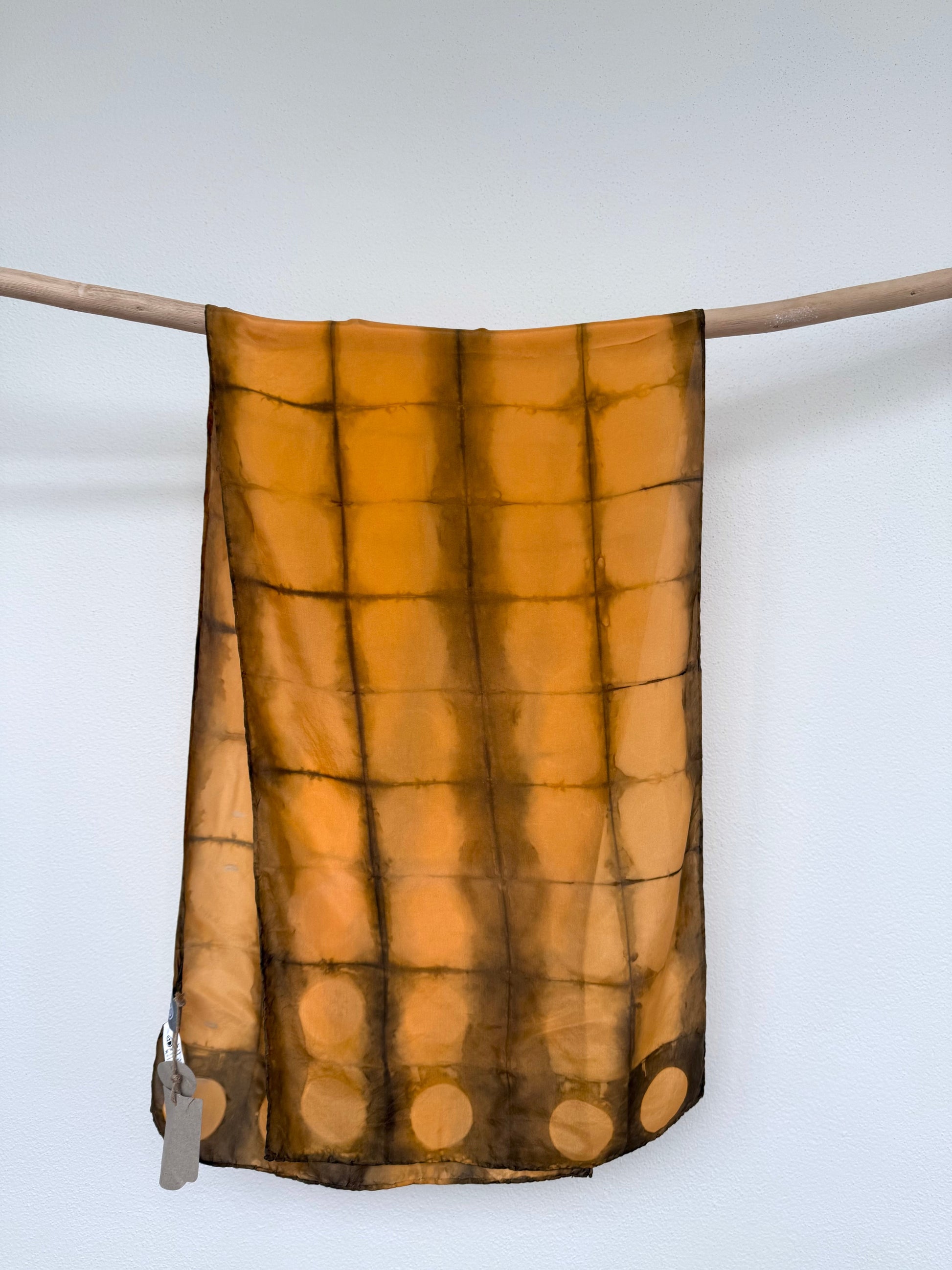Annatto and sweet chestnut dyed orange brown shibori silk scarf by DOT 'N' POT
