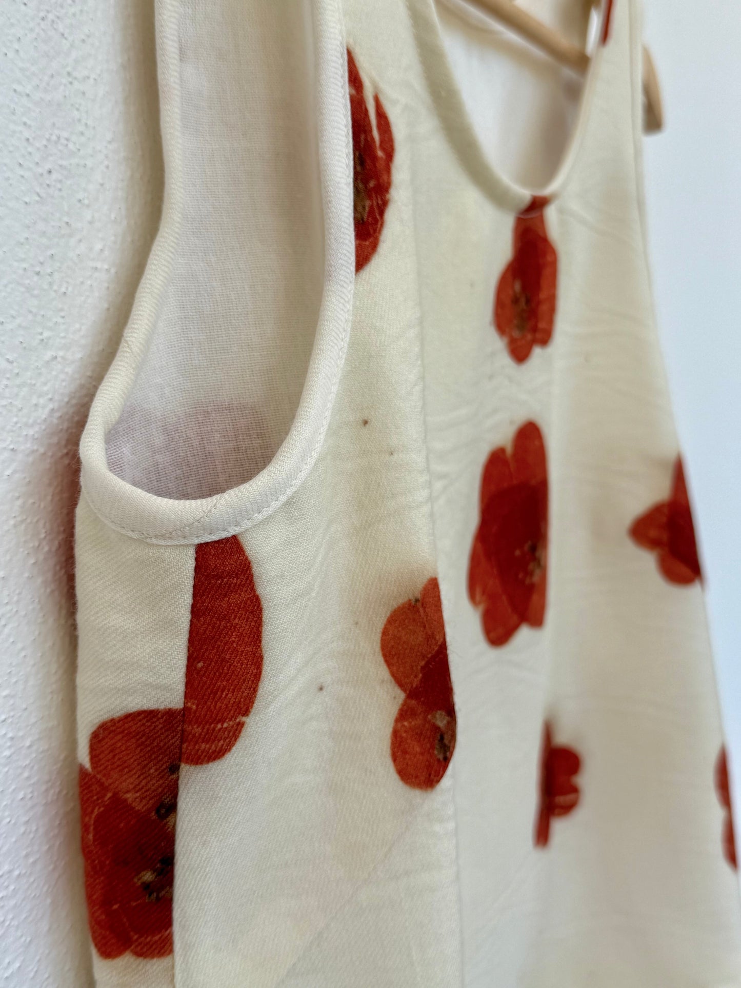 Tank top with eco-printed poppy pattern made with eucalyptus leaves - close-up of the sewing