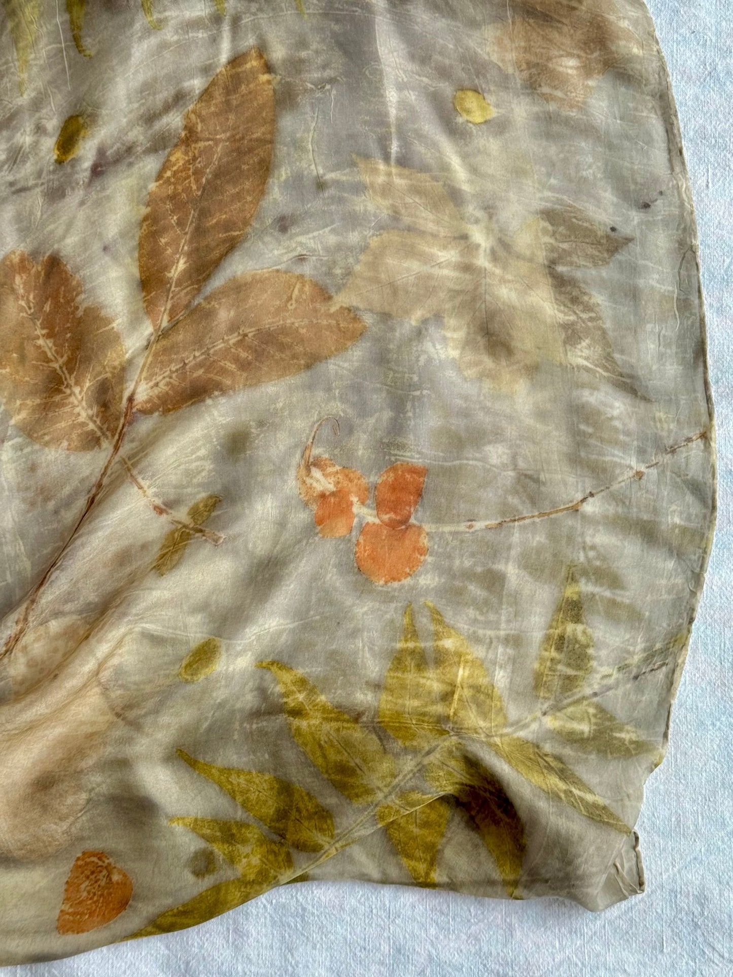 autumn themed eco-printed walnut eucalyptus silk scarf - close up of the pattern by DOT 'N' POT