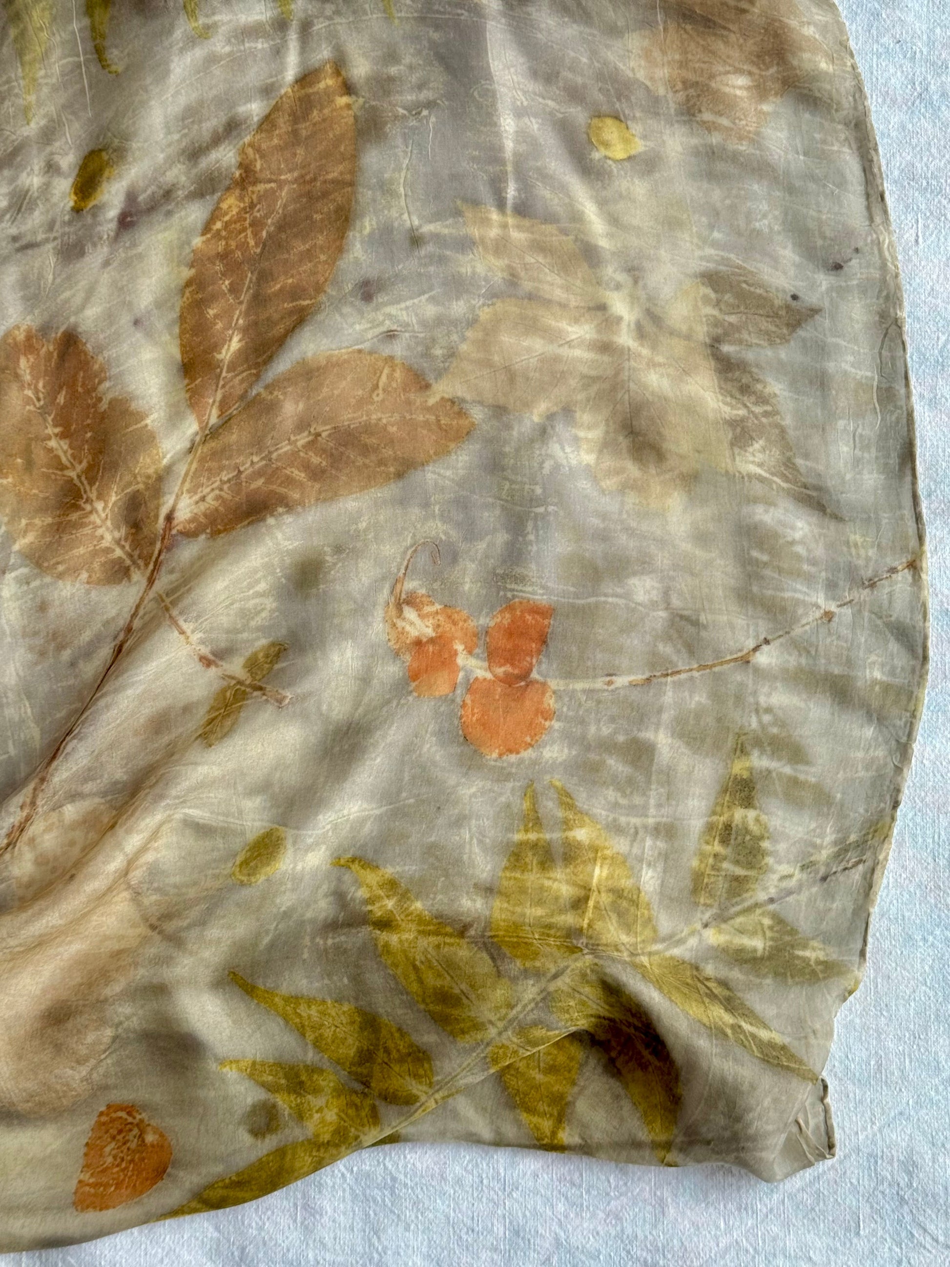 autumn themed eco-printed walnut eucalyptus silk scarf - close up of the pattern by DOT 'N' POT