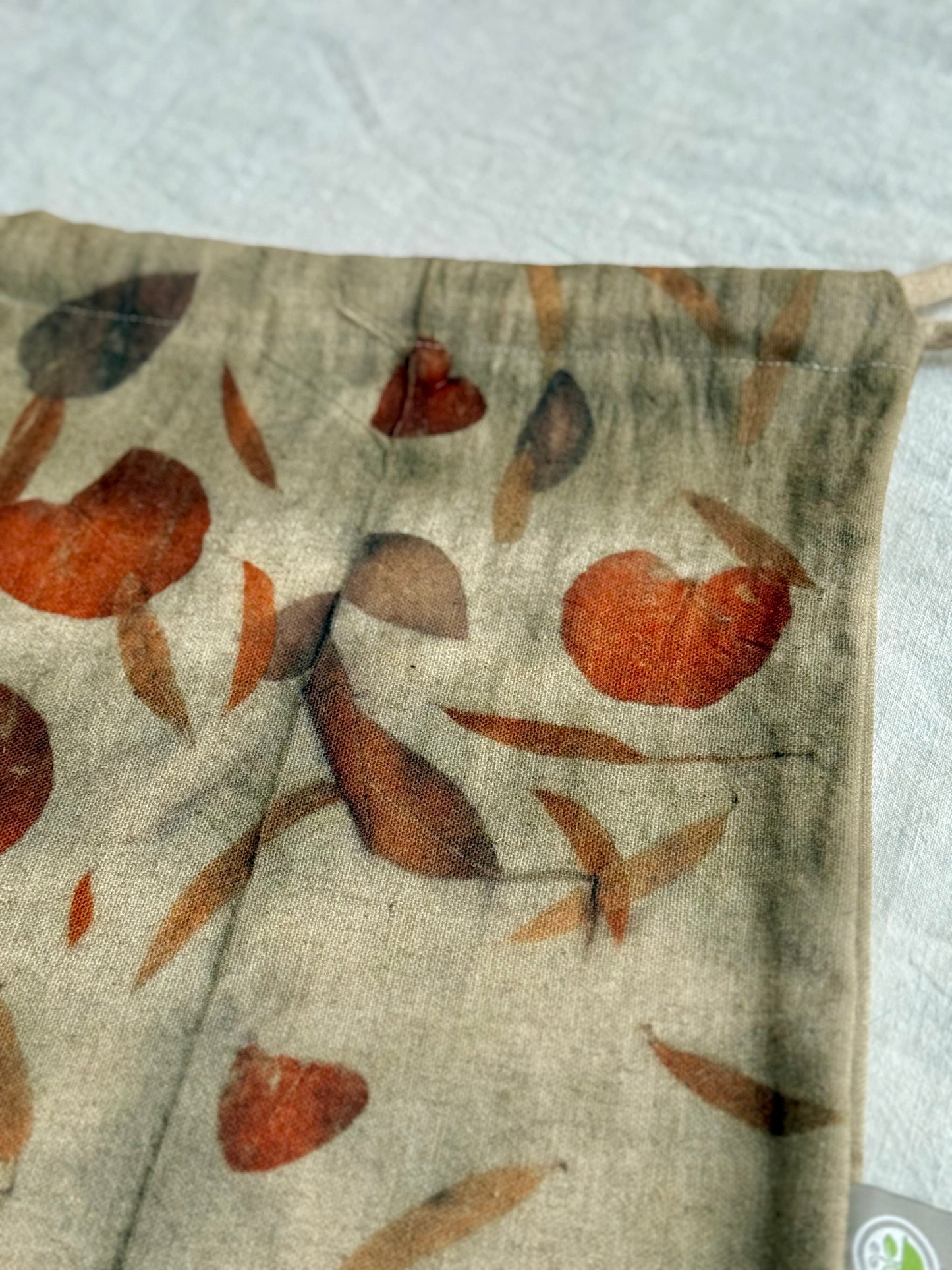 eucalyptus leaves pattern on a natural woolen bag