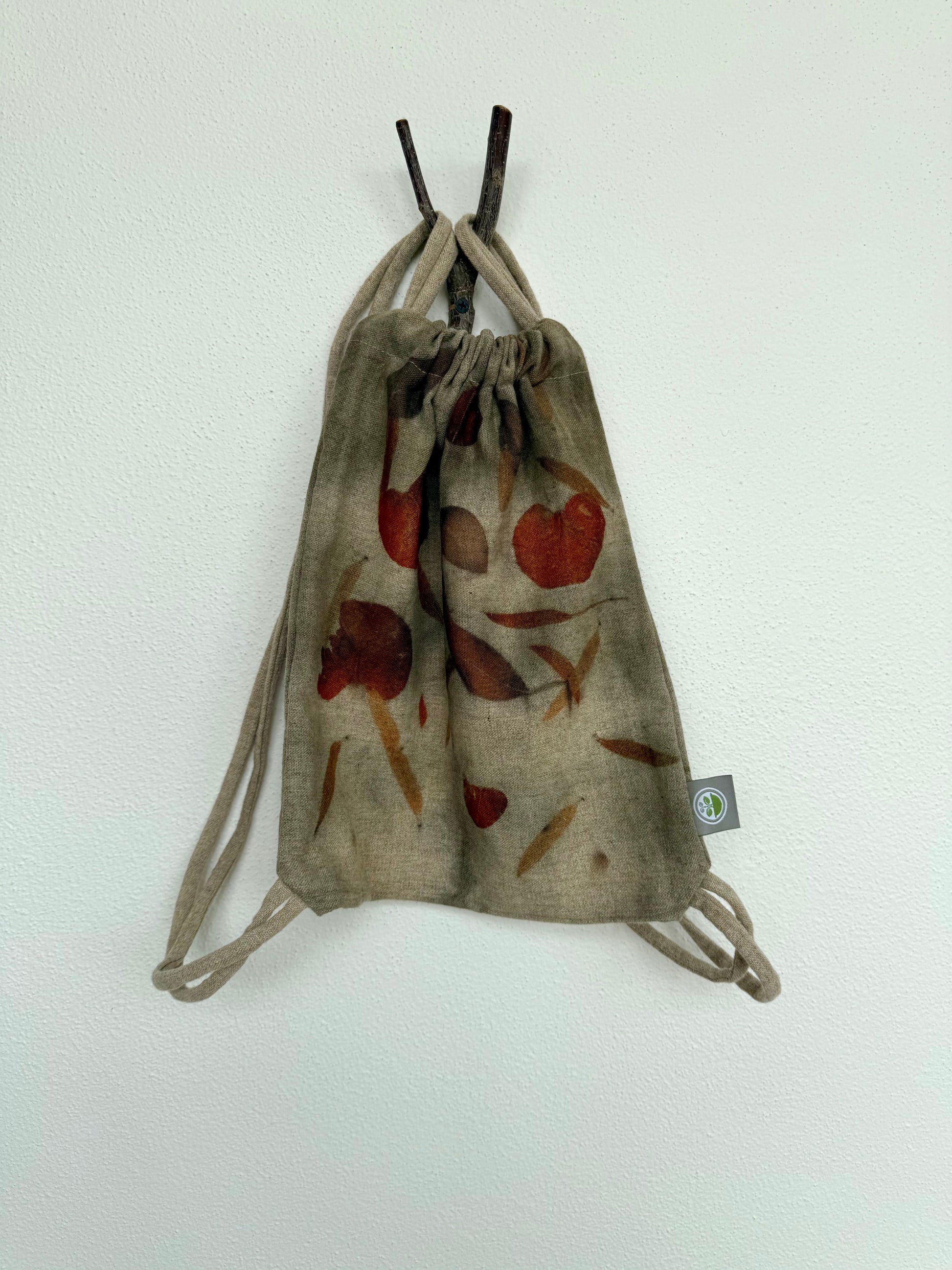 woolen drawstring bag with eco-printed eucalyptus leaves by DOT 'N' POT