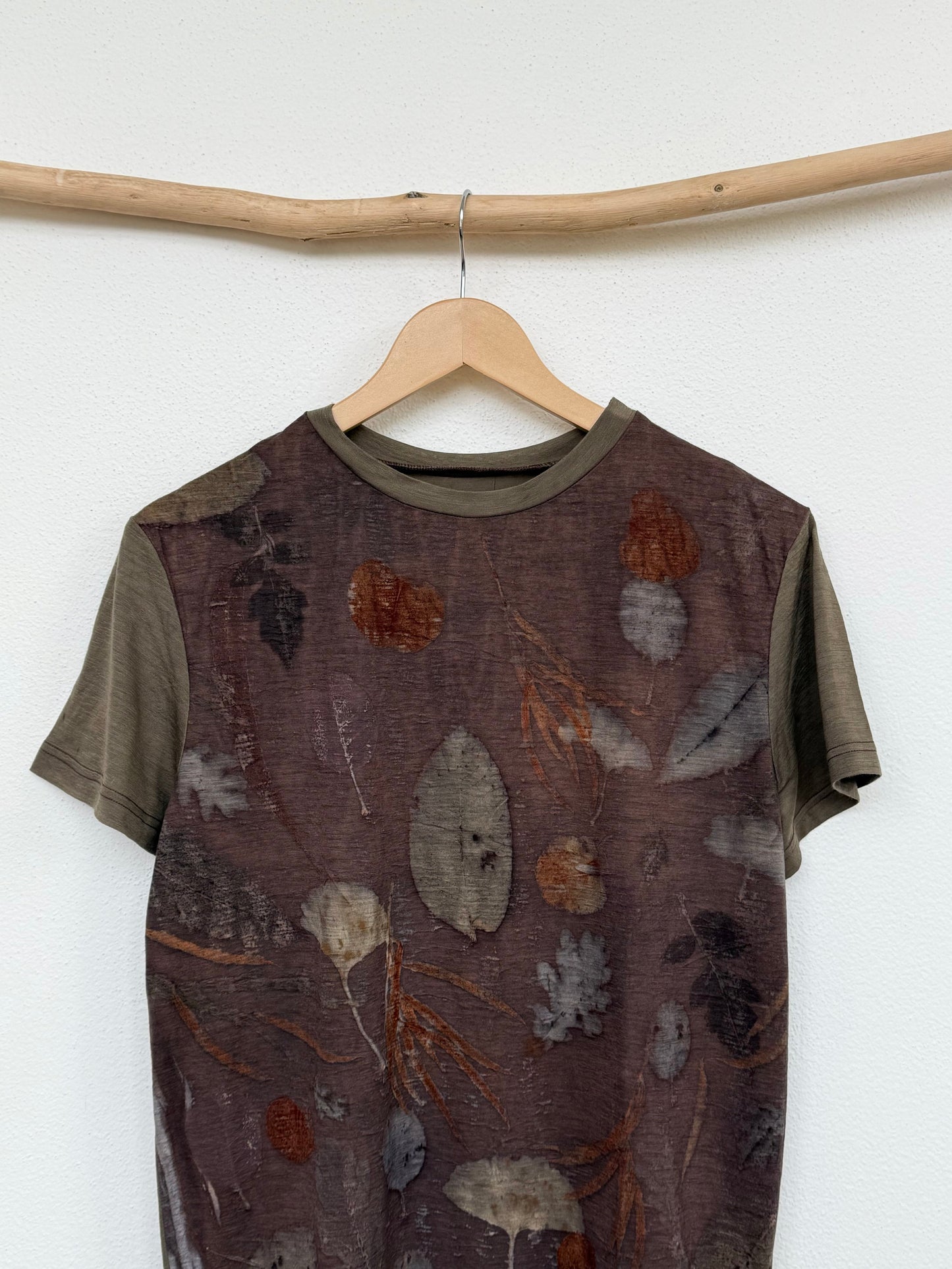 front part of a uprle naturally dyed merino t-shirt with floral, eco-printed pattern