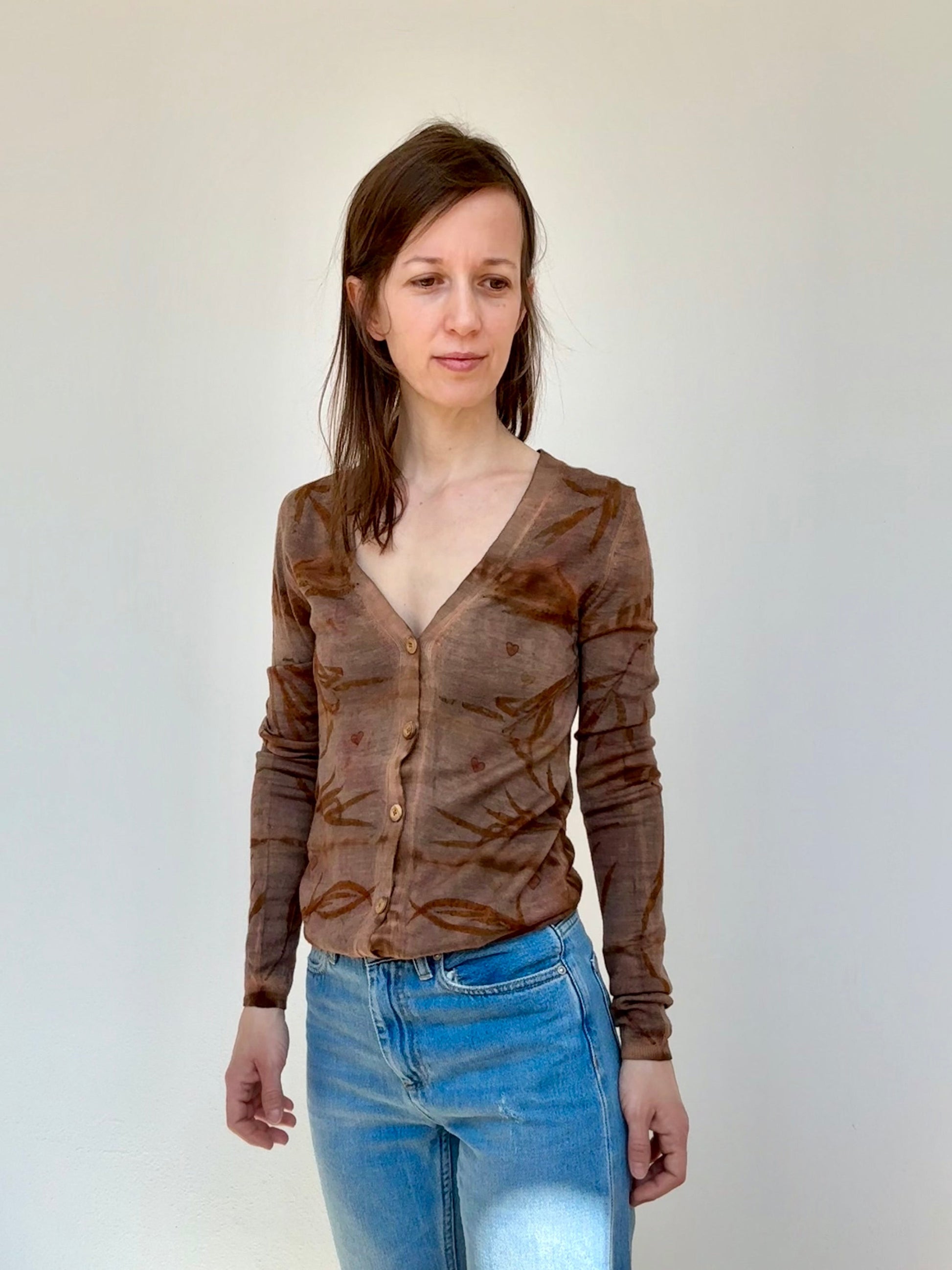 woman wearing a brown, naturally dyed woolen sweater, made with cutch, walnut and eucalyptus by DOT 'N' POT
