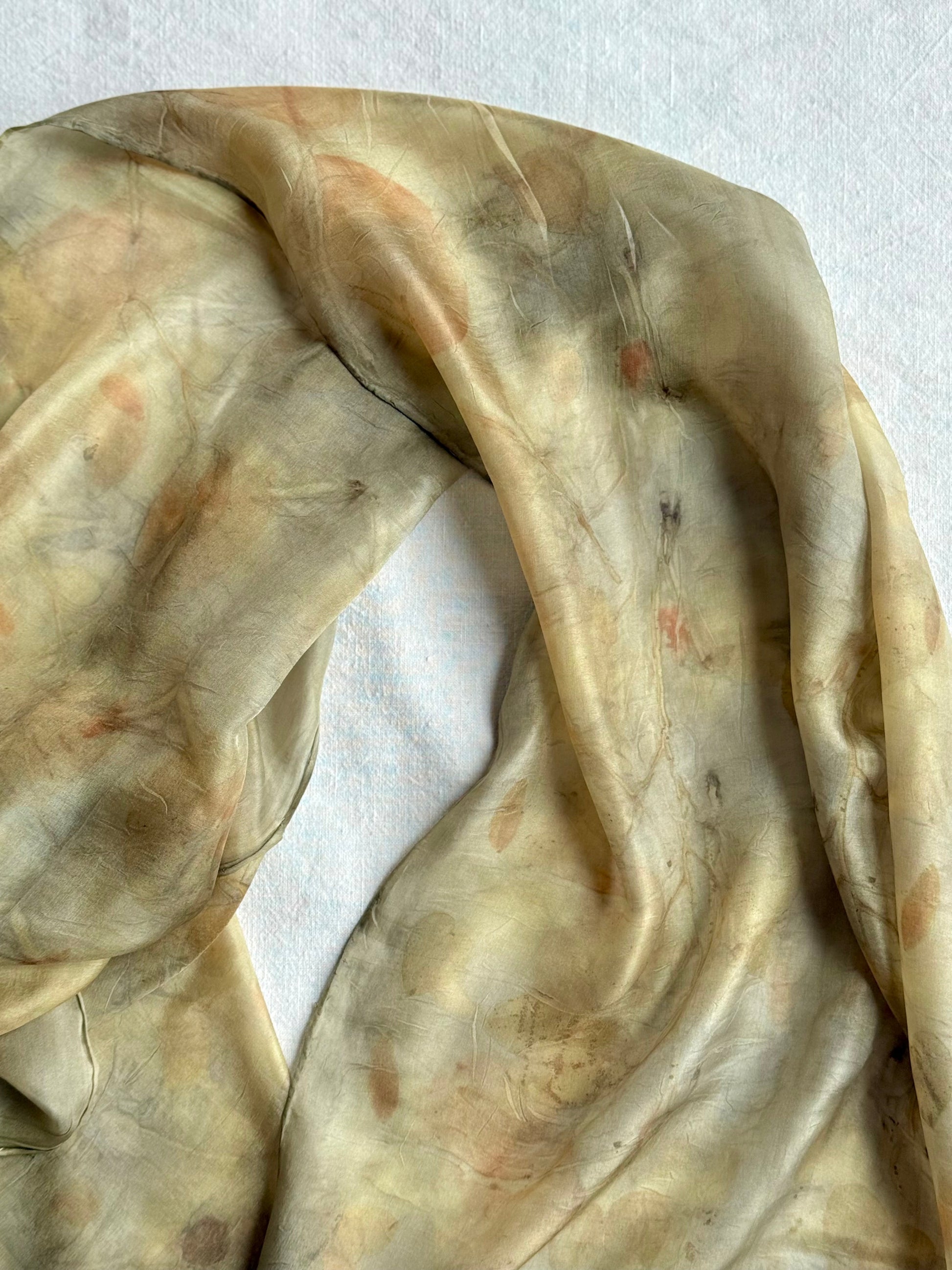 naturally deyd silk scarf with blackberry leaves and eucalyptus on a white background by DOT 'N' POT