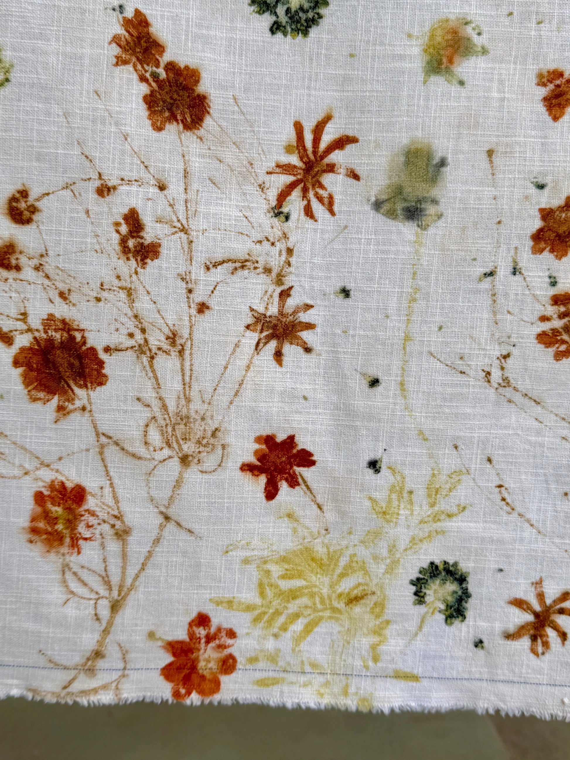 eco-printed linen fabric - close-up of various coreopsis flowers