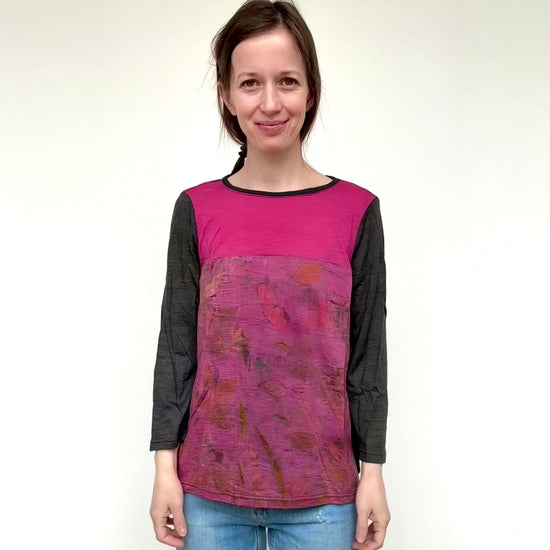 woman wearing a merino wool top dyed with cochineal and logwood, eco-printed with plants by DOT 'N' POT